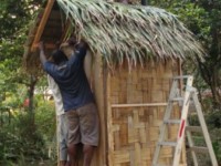 Roof goes on composting toliet