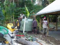 Installing tanks at Melip