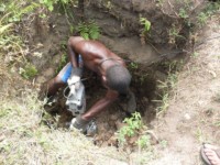 Songi digging well at soap factory
